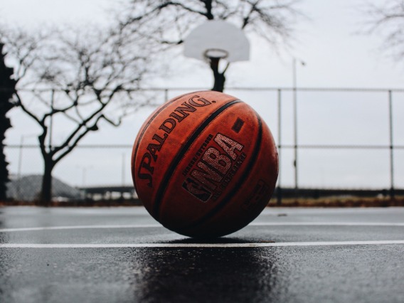 NBA Spalding basketball. - Unsplash, TJ Dragotta