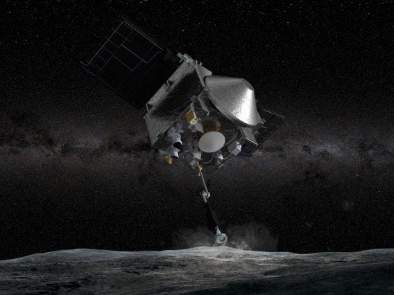 OSIRIS-REx spacecraft collecting samples in space