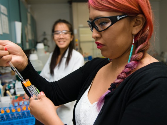 Two females working in the lab