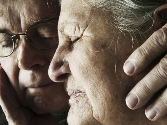 An older Couple Holding Each other