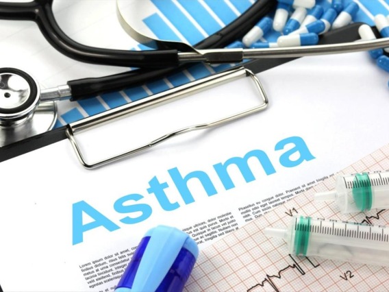Paperwork with "Asthma" in the center.