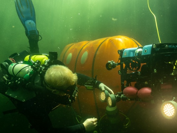 Diver with new Machine Underwater