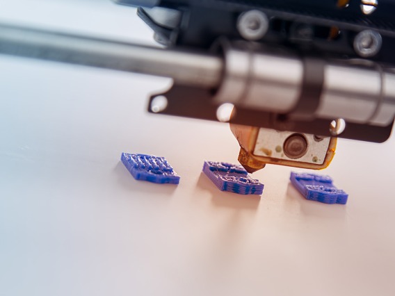 a 3d printer designing a prototype