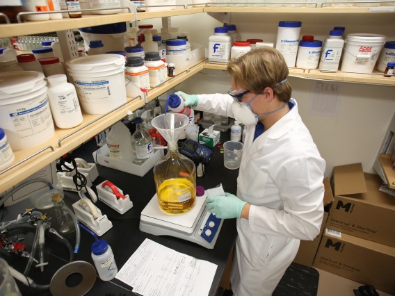 Student worker prepares a custom reagent in the BIO5 Media Facility