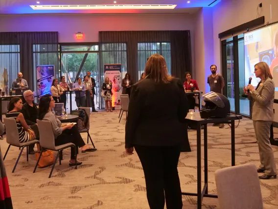 A group of people at a networking event
