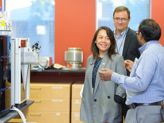 people from the community were invited into a UArizona lab to meet a researcher