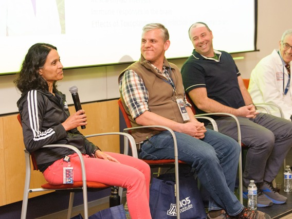 A group of researchers having a panel discussion