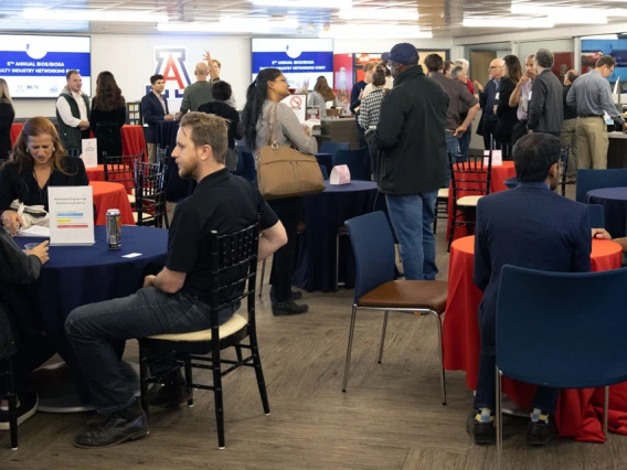Group of people sitting and mingling at a networking event