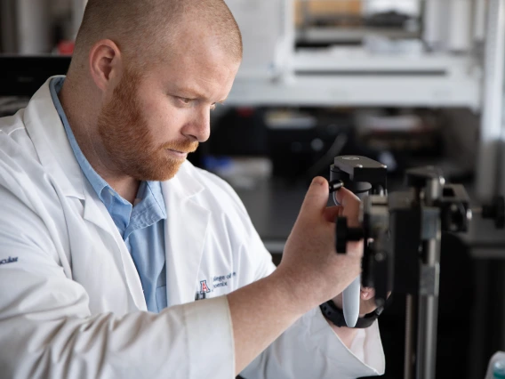 Scientist conducts research in a lab