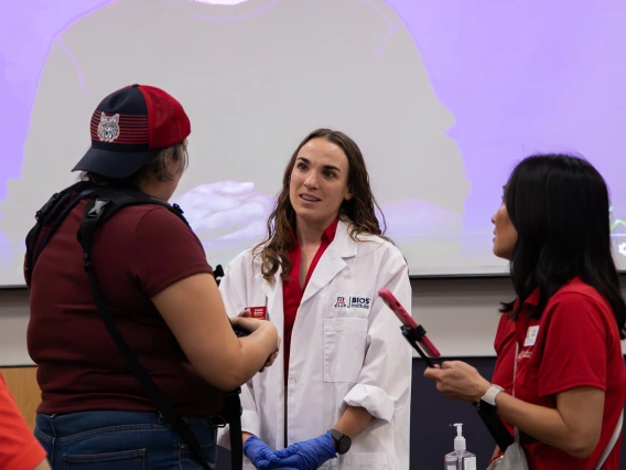 A BIO5 staff member explaining the Supertasters activity