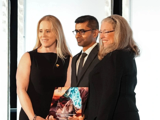 BIO5 Interim Director Vignesh Subbian receives the Michael A. Cusanovich Bioscience Educator of the Year award, presented by Kristen Swingle, President and Chief Operating Officer of the Critical Path Institute and BIO5 External Advisory Board member and Joan Koerber-Walker. 