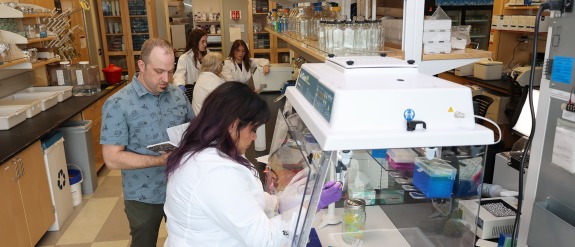 a group of researchers working in a lab.