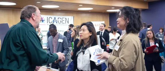 students talking to a person from industry