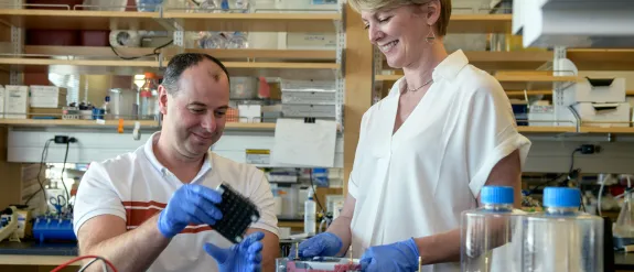 A team of scientists working in a research lab.