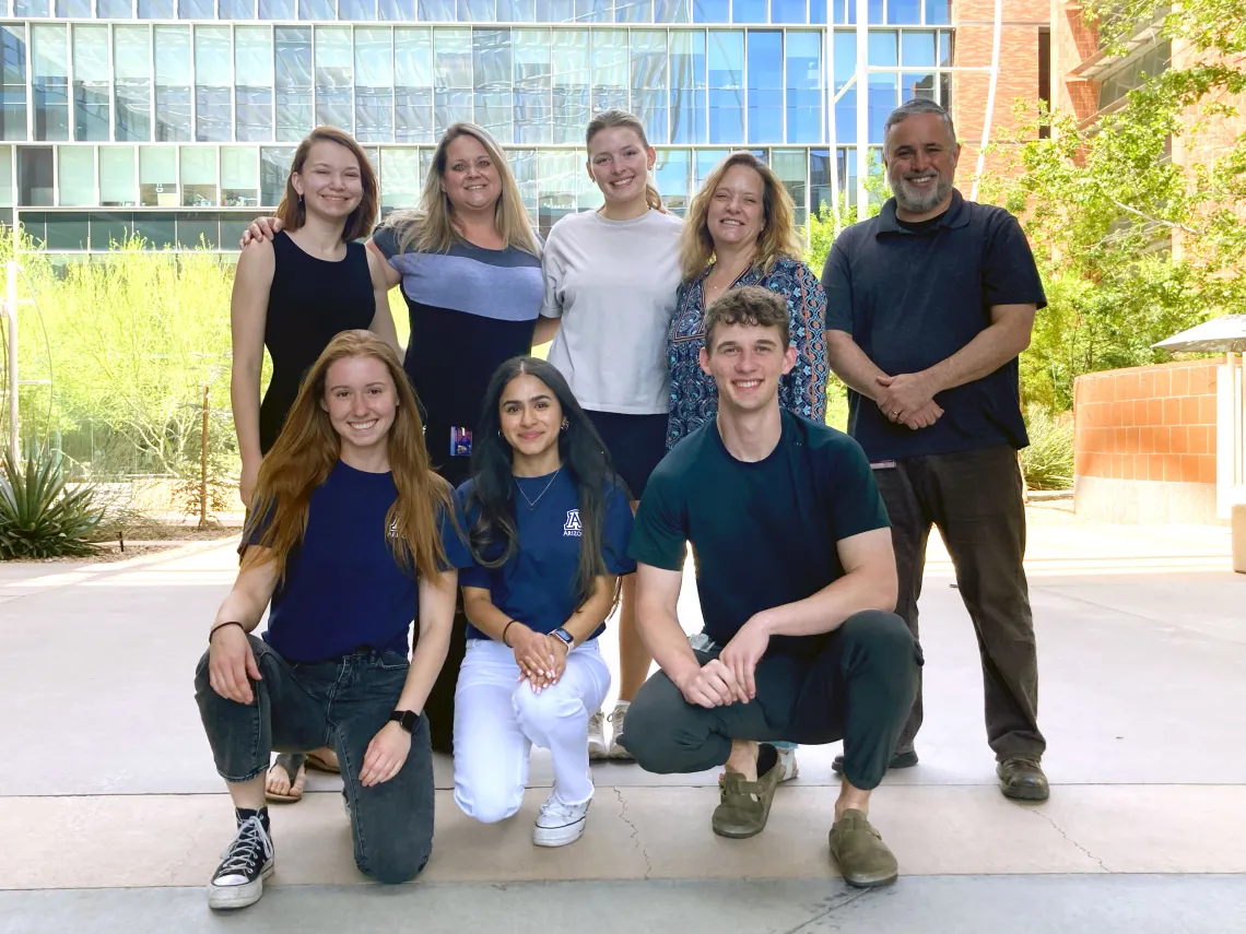 Group of BIO5 Ambassador interns and their mentors pose for a photo outside the BIO5 Institute