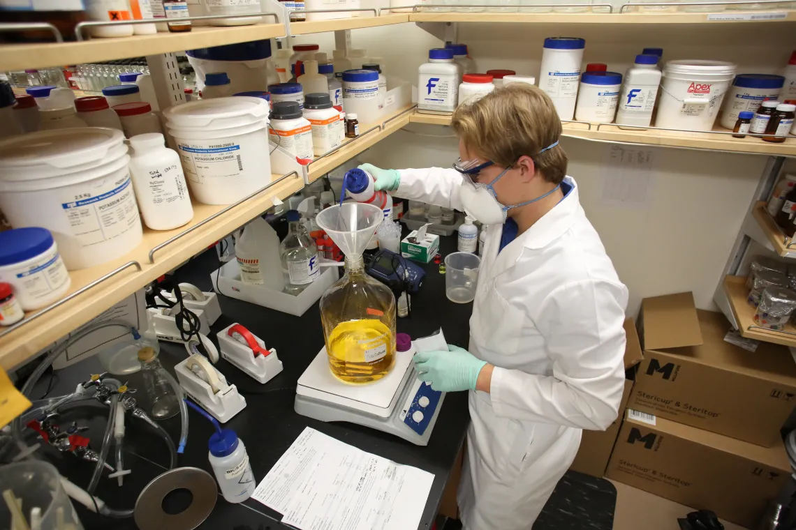 Student worker prepares a custom reagent in the BIO5 Media Facility