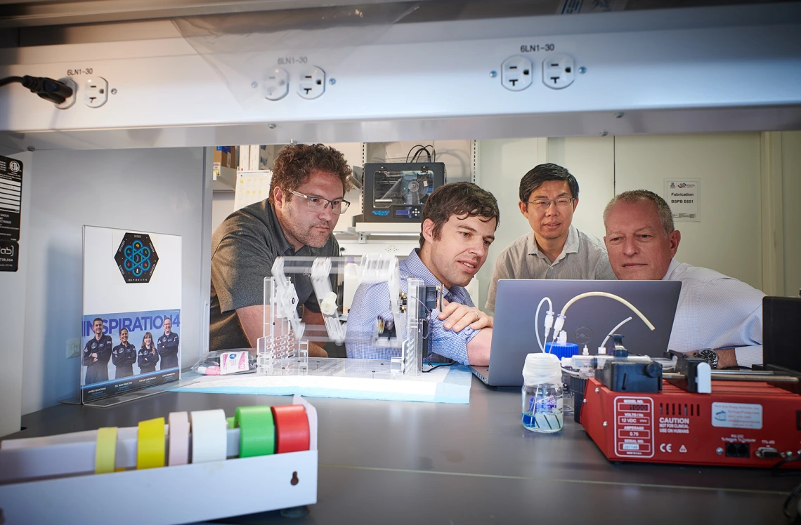 Frederic Zenhausern working in his lab