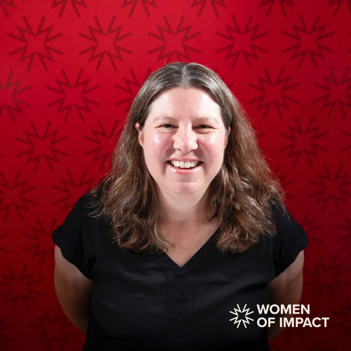 Erika eggers smiling with designed leaf background 