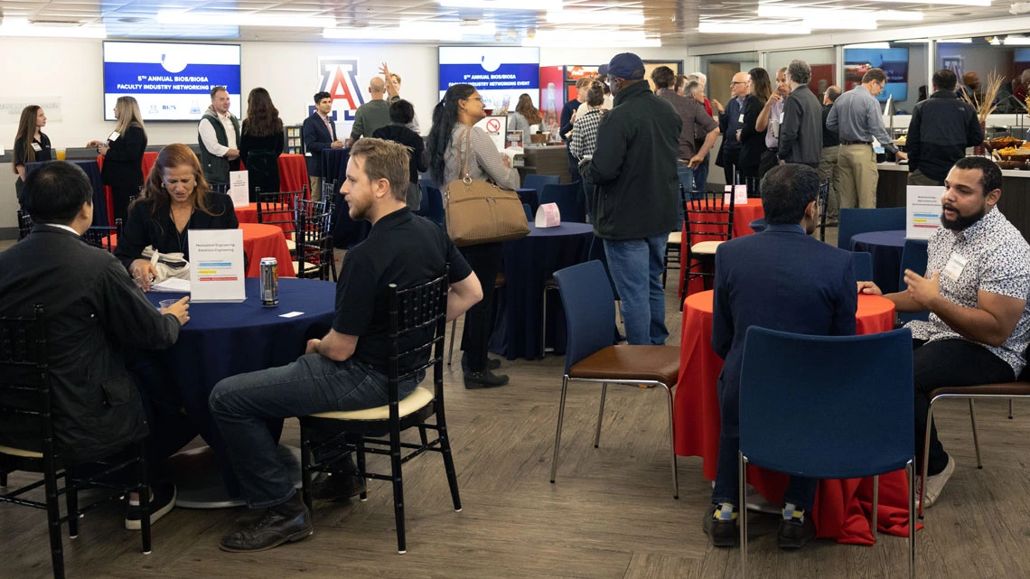 Group of people sitting and mingling at a networking event