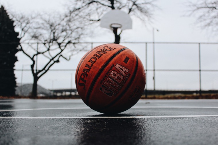 NBA Spalding basketball. - Unsplash, TJ Dragotta