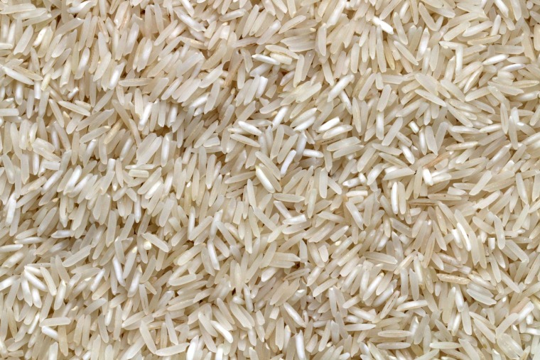 Close-up of raw white rice. - unsplash