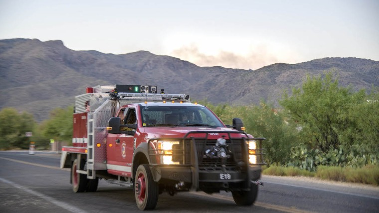 Firefighter truck in front of mountain background