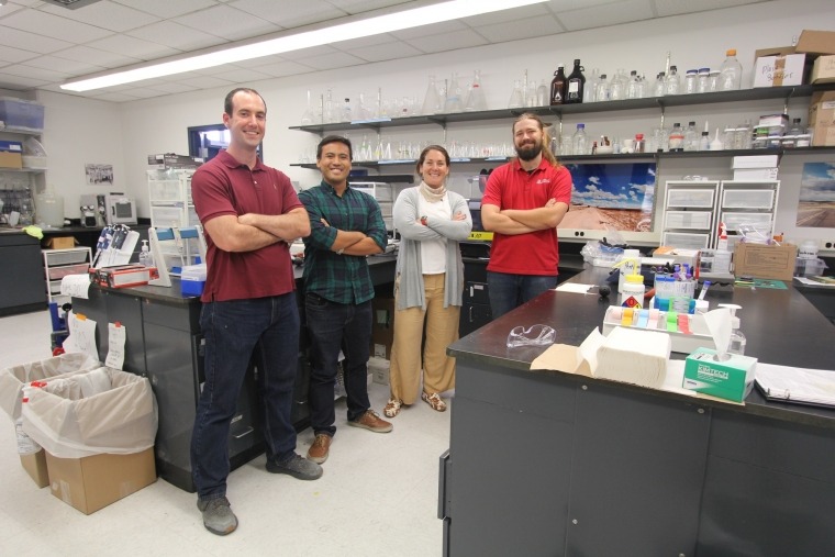 From left: UArizona researchers Cameron Malloy, a chemical engineering graduate student; Suchol Savagatrup, assistant professor of chemical and environmental engineering; Vicky Karanikola, assistant professor of chemical and environmental engineering; and Jack Welchert, a biosystems engineering graduate student.