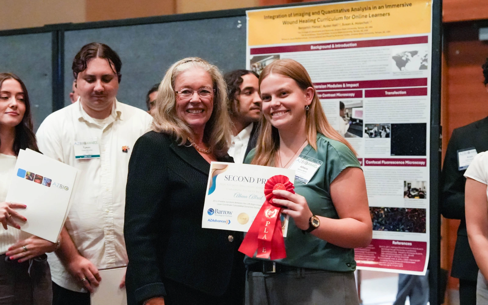 Joan Koerber-Walker, President and CEO of the Arizona Bioindustry Association, and Athena Allred, KEYS Alumna, as Allred won second place at the Student Discovery Zone.